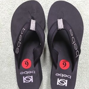 Bebe wedge flip flops
